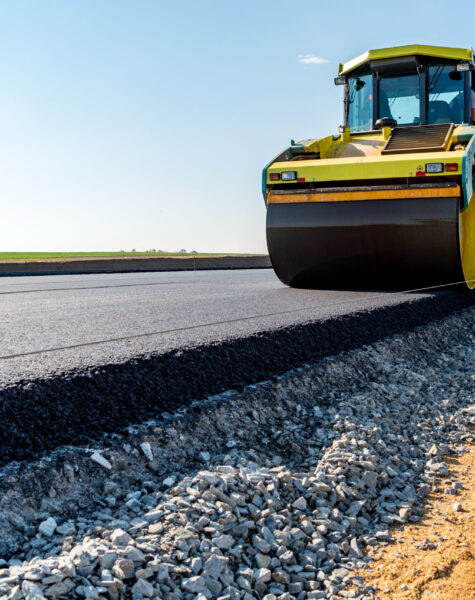 Road rollers building the new asphalt road